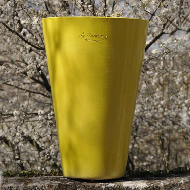 Extra Large Bright Yellow Contemporary Mazagran French Pot With A Glaze Finish In A Garden from Anduze France
