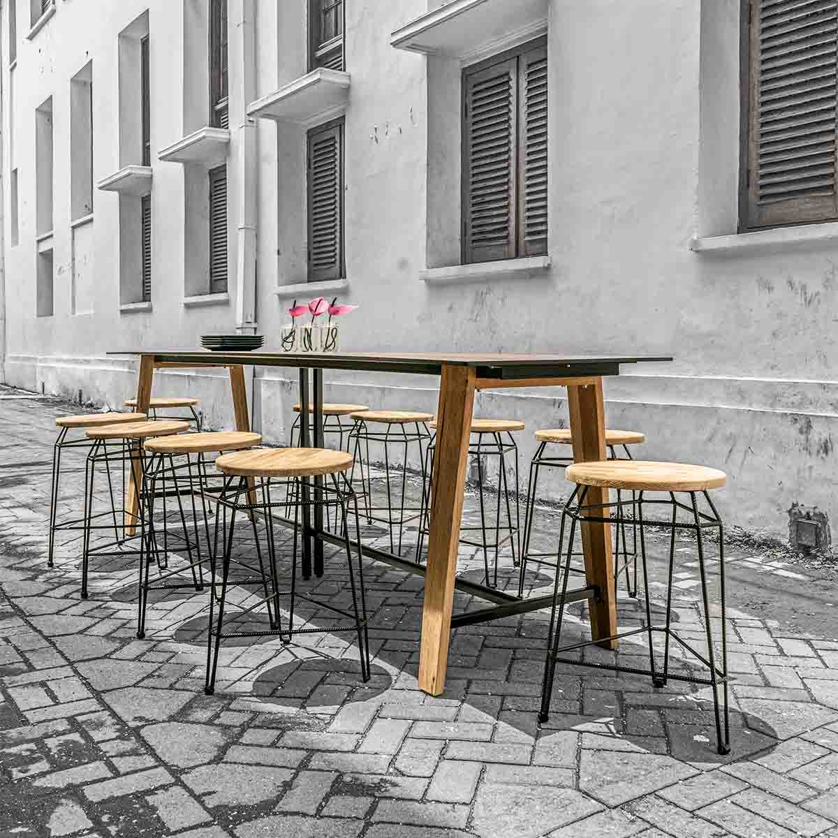 commercial outdoor bar stools with long bar table in laneway hospitality venue