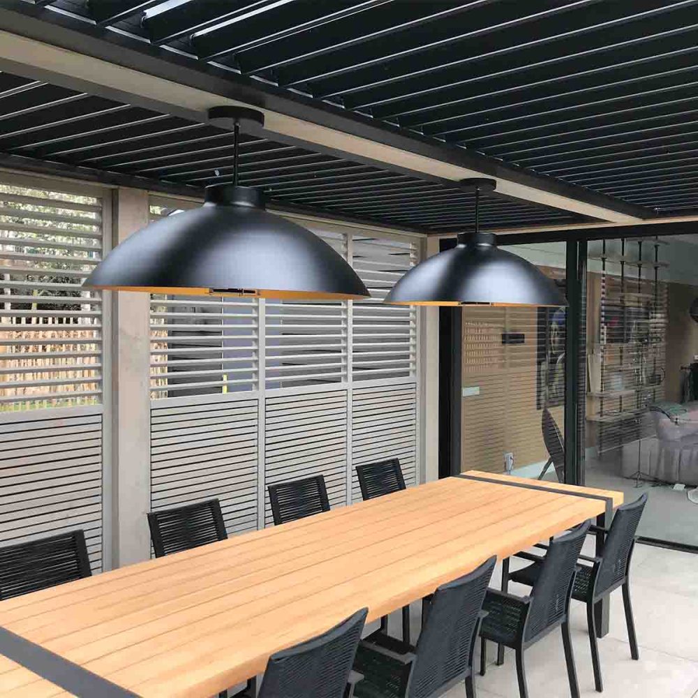 two commercial outdoor pendant heaters in outdoor room