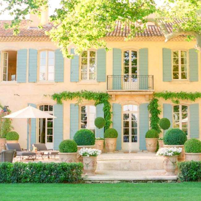 Charming French Style Garden with Multiple Classic French Pots in Patine Ancienne from Anduze France